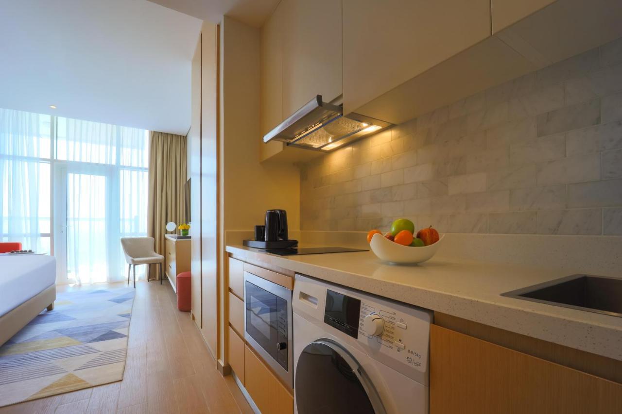 Adagio Jumeirah Village Triangle Dubai Exterior photo